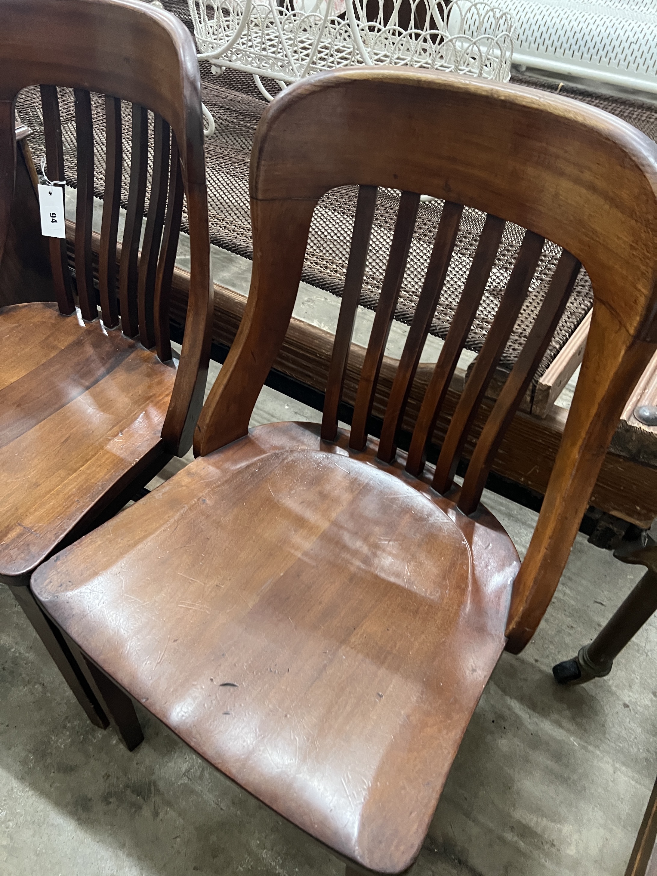 A pair of early 20th century mahogany office chairs, width 48cm, depth 43cm, height 86cm